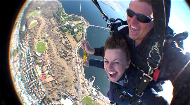 Leap of faith ... Carolyne Jasinksi takes a tandem skydive over Hobart.