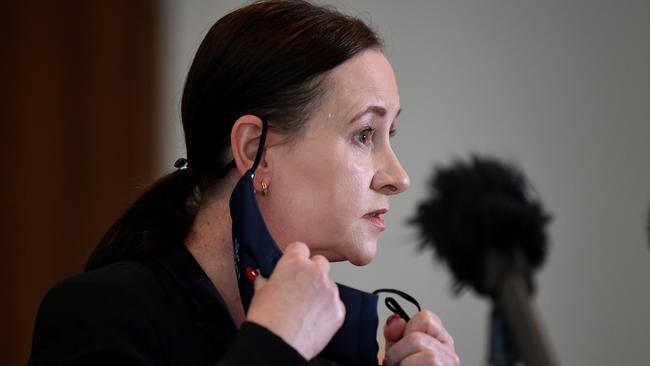 Queensland Health Minister Yvette D'Ath takes off her mask ahead of a Covid-19 press conference. Picture: NCA NewsWire/Dan Peled