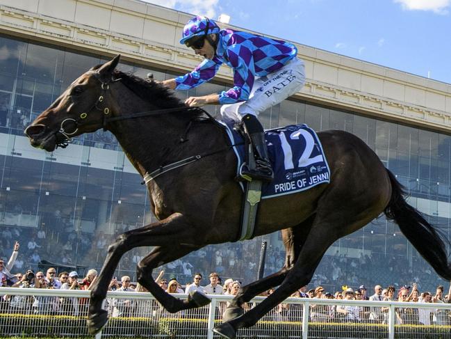 MELBOURNE, AUSTRALIA - MARCH 16: Declan Bates riding Pride of Jenni defeats Craig Williams riding Mr Brightside and Cascadian in Race 8, the The Sharp Eit All-star Mile, during The All-Star Mile Race Day at Caulfield Racecourse on March 16, 2024 in Melbourne, Australia. (Photo by Vince Caligiuri/Getty Images)