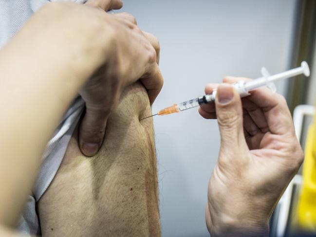 People are urged to get vaccinated. Picture: Tony McDonough/NCA NewsWire