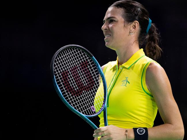 Australia's Ajla Tomljanovic reacts as she plays against against Slovakia's Rebecca Sramkova during their quarter-finals singles tennis match between Australia and Slovakia at the Billie Jean King Cup Finals at the Palacio de Deportes Jose Maria Martin Carpena in Malaga, southern Spain, on November 17, 2024. (Photo by JORGE GUERRERO / AFP)