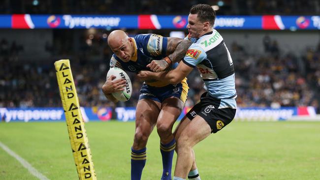 Connor Tracey tackles Blake Ferguson over the sideline.