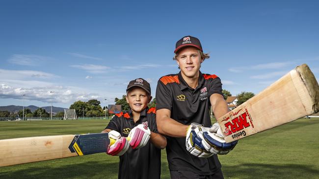 Louis Smith (front) pictured here with younger brother Sam after both scored centuries on the same day for the University of Tasmania Cricket Club with Louis scoring a double century. Picture: Zak Simmonds.