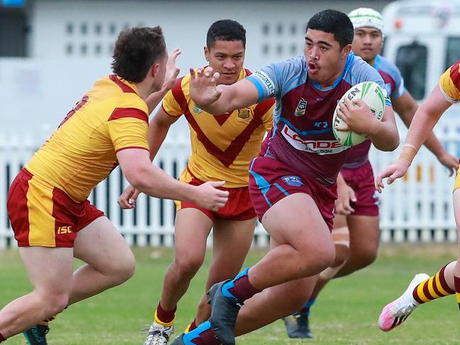 Hills Sports’ Luron Patea, breaks through the Holy Cross defence.