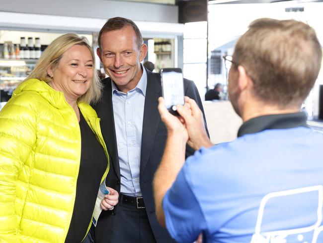 Tony Abbott posing for a fan at Mosman wharf. Picture: Annika Enderborg