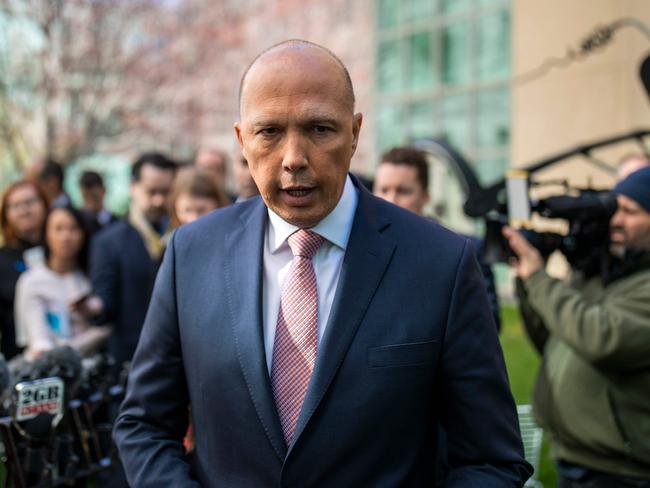 Mr Dutton leaves the media back after yesterday’s controversial Liberal party room meeting. Picture: Sean Davey/AFP