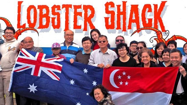 MP Ian Goodenough (blue striped shirt) with members of the Australia Asia Exchange Conference in June. 