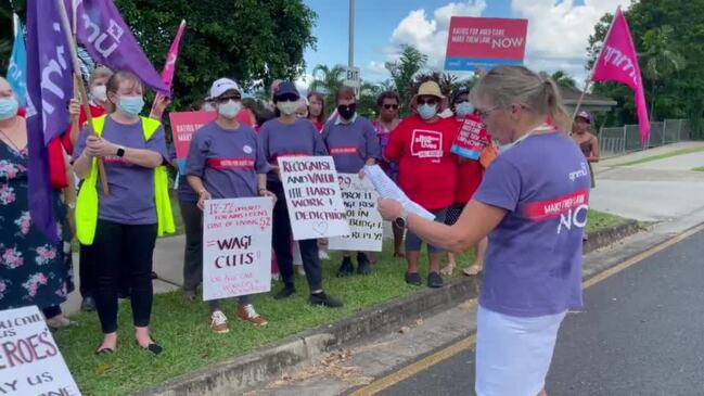 Aged care worker Dianne Power addresses a rally at Regis Whitfield