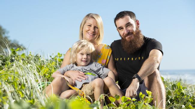 Sunshine Coast parents Kim and Damien Bogatek with their 5 year old son Taj who survived life saving in-womb surgery before he was even born. Picture: Lachie Millard