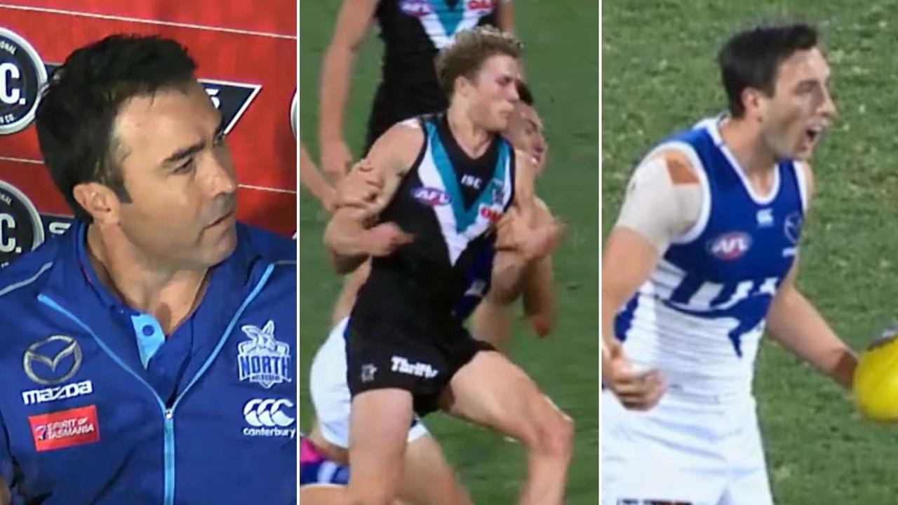 Brad Scott and Sam Wright were left baffled by a late free kick in North Melbourne's loss to Port Adelaide.