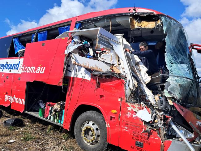 The wreckage of a Greyhound bus crash which claimed the lives of three women at Gumlu, on one of the most dangerous stretches of the highway.