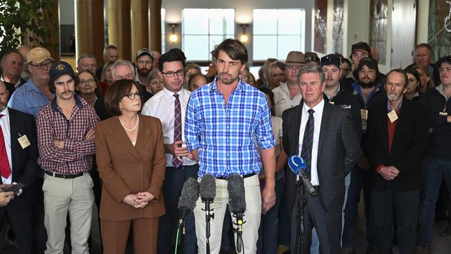 Party leader of the National Party of Australia, David Littleproud and Australian farmers address the media at Parliament House in Canberra. Picture: NCA NewsWire / Martin Ollman