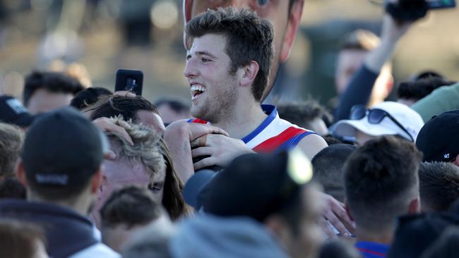 Mark Kovacevic celebrates West Preston-Lakeside’s 2018 premiership.