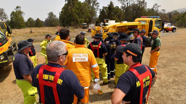 Rural firefighters preparing to fight fires at Spicers Gap. Picture: AAP Image/Darren England)