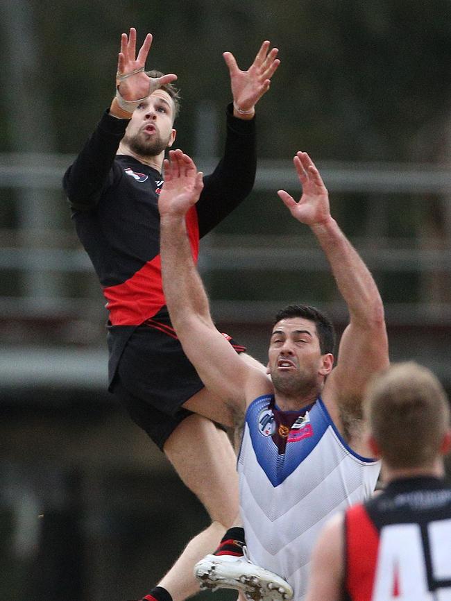 Tim Currie flies high against Banyule earlier this year. Picture: Hamish Blair