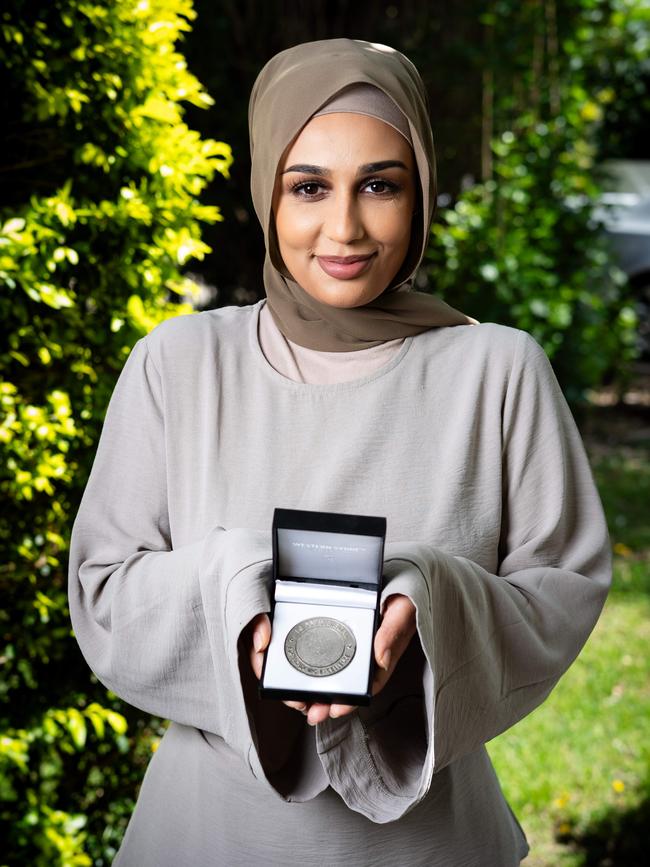 Afifa Fahez with her Dean's Medal after scoring in the top 2 per cent of her graduate class. Picture: Tom Parrish