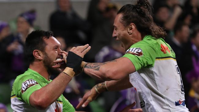 MELBOURNE, AUSTRALIA - AUGUST 17: Jordan Rapana of the Raiders celebrates with Charnze Nicoll-Klokstad after scoring a try during the round 22 NRL match between the Melbourne Storm and the Canberra Raiders at AAMI Park on August 17, 2019 in Melbourne, Australia. (Photo by Robert Cianflone/Getty Images)