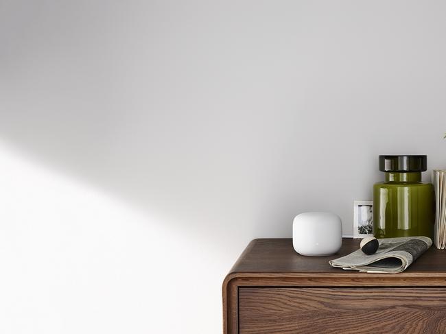 Google's Nest Wi-Fi mesh system doubles as a smart speaker and a night light.,