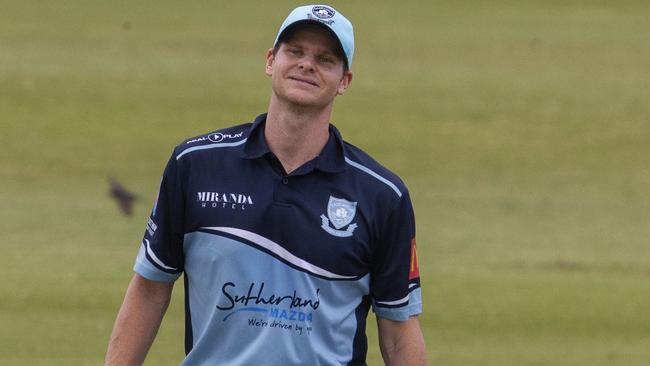 A dejected Steve Smith walks off the field after being caught out at Coogee oval today. David Warner's Randwick-Petersham v Steve Smith's Sutherland. The first time the two banned stars have come face to face on the field. Pic Jenny Evans