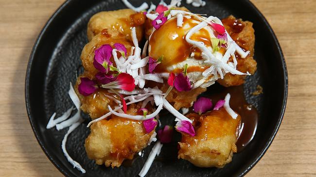 Fried banana with coconut and salted caramel sauce. Picture: Ian Currie