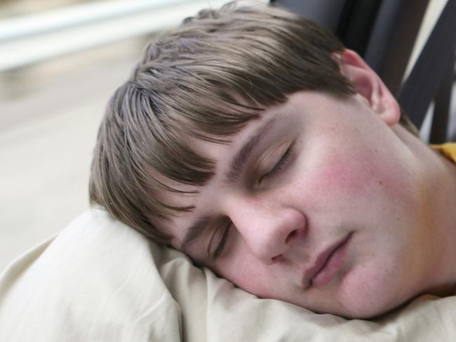 Sleeping. istock photo bored kid road trip