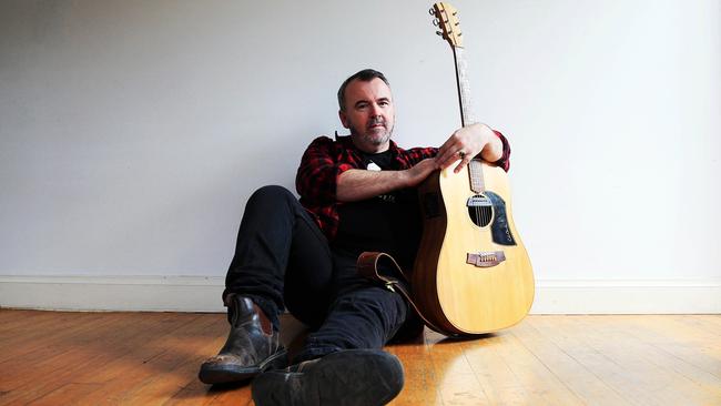 Country singer-songwriter Michael Waugh pictured in his Melbourne home. Picture: Aaron Francis