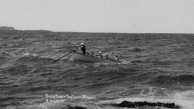 Members of the Sly family in the Manly surfboat off Manly. Picture State Library of NSW