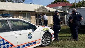 Police guarding the scene of a fatal dog attack at Maryborough.