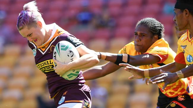 Chelsea Baker on the charge for the Broncos against PNG Orchids at Suncorp Stadium. Picture: AAP