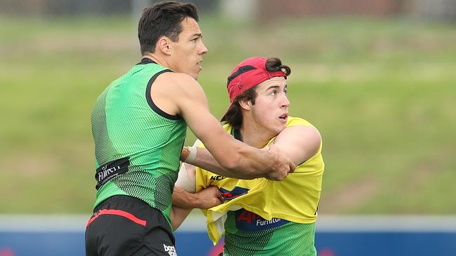 Andrew McGrath wrestles with Dylan Shiel. Picture: Michael Klein