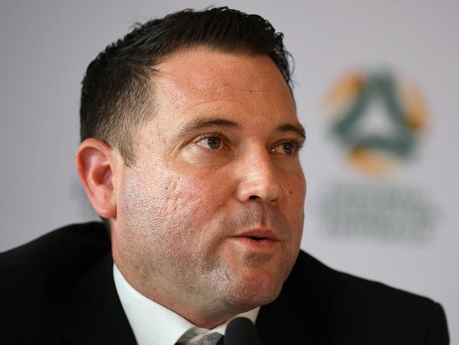Football Federation Australia (FFA) Chief Executive Officer James Johnson speaks to the media during a press conference in Sydney, Tuesday, March 24, 2020. (AAP Image/Joel Carrett) NO ARCHIVING