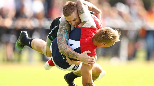 Dayne Beams tackles James Harmes. Picture: Getty Images 