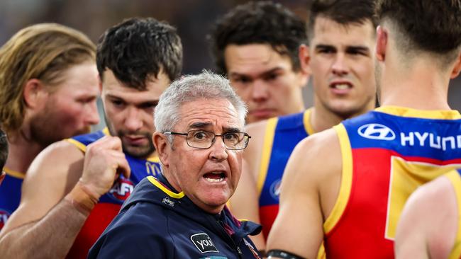 Chris Fagan, Senior Coach of the Lions addresses his players during a match. Picture: Dylan Burns/AFL Photos via Getty Images)