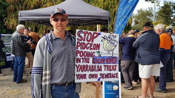 Stockleigh resident Leeroy Bobermein with his poo placard.