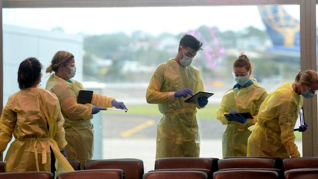 NSW Health personnel at Sydney airport. Picture: Jeremy Piper