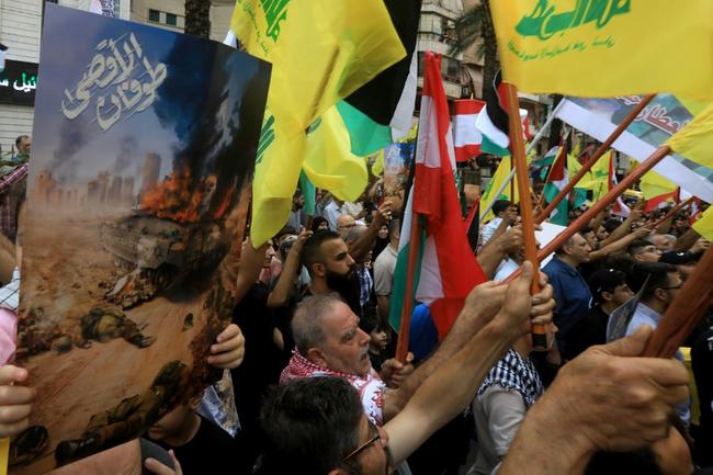 Hezbollah faithful  demonstrate in support of Hamas in Beirut