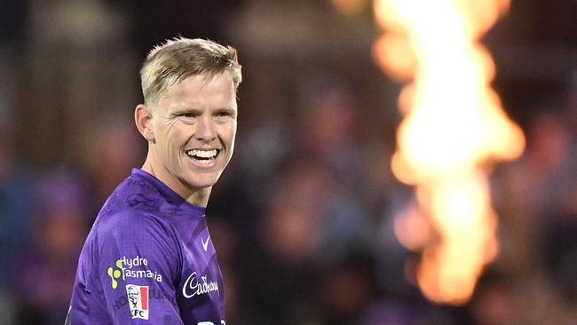 HOBART, AUSTRALIA - JANUARY 09: Nathan Ellis of the Hurricanes celebrates the wicket of Nick Larkin of the Stars during the Men's Big Bash League match between the Hobart Hurricanes and the Melbourne Stars at Blundstone Arena, on January 09, 2023, in Hobart, Australia. (Photo by Steve Bell/Getty Images)