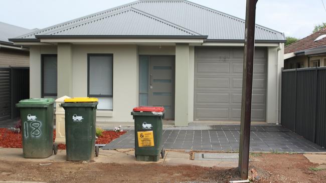 The same house back in January, with a Stobie pole in front of its garage.