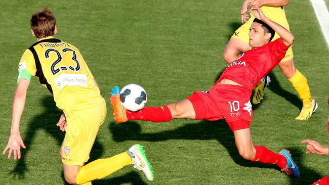 Playmaker Marcelo Carrusca stretches to control the ball during Adelaide United’s FFA Cup final victory over Perth Glory. Picture: Sarah Reed.