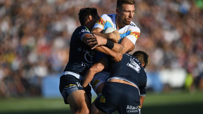 Bryce Cartwright is hit hard in defence. Digital image by Scott Davis © NRL Photos