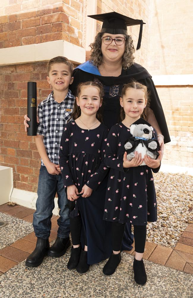 Bachelor of Nursing (Distinction) graduate and Faculty Medal recipient Kaylee Fitzsimmons with her kids Riley, Mackenzie (centre) and Madison Fitzsimmons UniSQ graduation ceremony at The Empire, Tuesday, June 25, 2024. Picture: Kevin Farmer