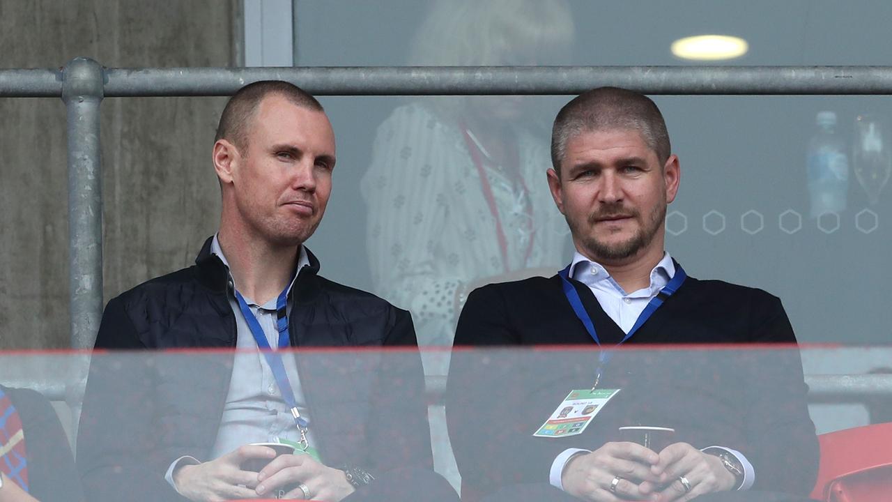 Carl Robinson (right) watches the Jets with Newcastle assistant coach Kenny Miller. Picture: Tony Feder/Getty Images
