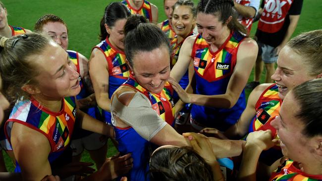 Daisy Pearce celebrates after her 50th game, which saw the Demons take care of the Gold Coast.