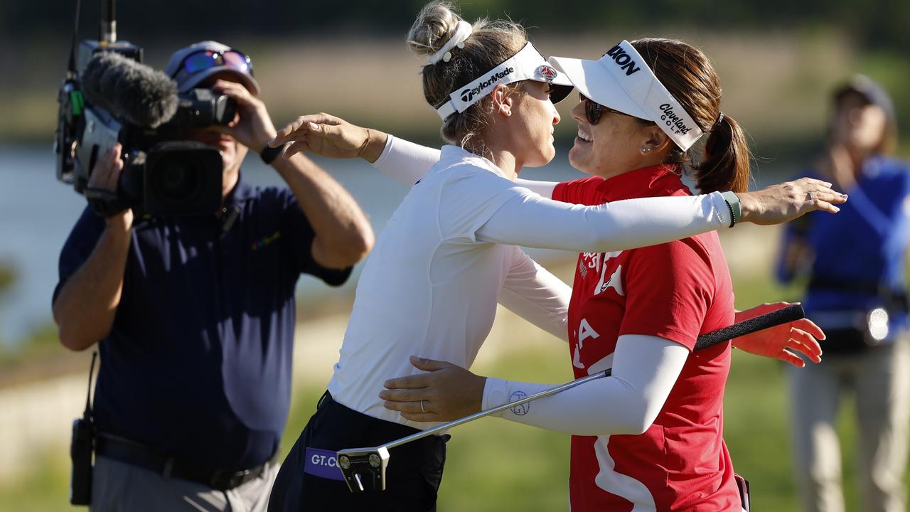 Nelly Korda and Hannah Green embrace on the 18th green in New Jersey. (Photo by Sarah Stier/Getty Images)