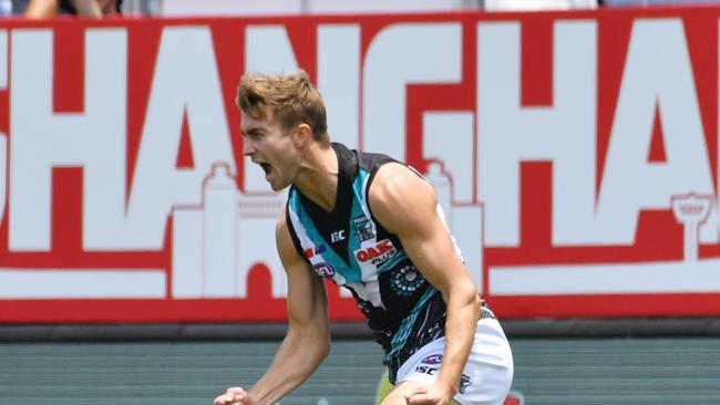 Dougal Howard celebrates the Power’s opening goal. Picture: AAP Image/David Mariuz