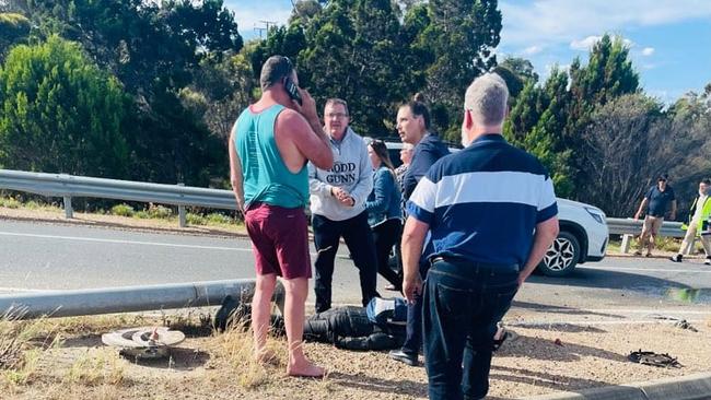 A motorbike rider lies on the ground injury following the Murray Bridge hit-run crash. Picture: Supplied