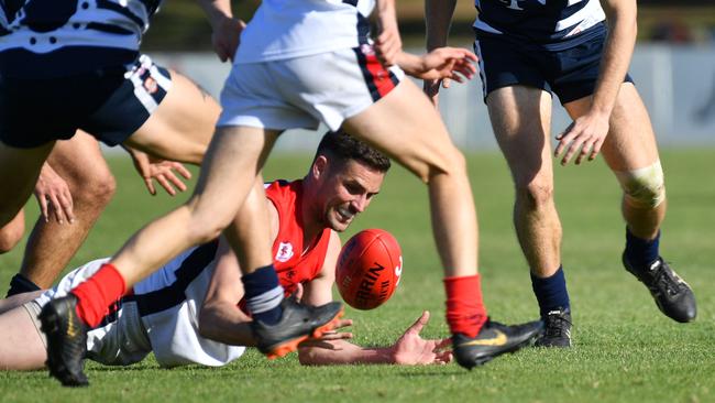 David Kearsley in the thick of the action for Flagstaff Hill against Noarlunga in the 2019 SFL grand final. Picture: AAP /Keryn Stevens