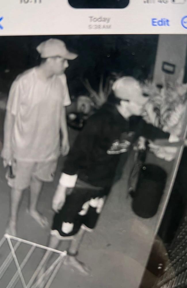 Two youth offenders casing apartments at Flynn Cct, Bellamack overnight on Friday. One appears to be holding a hammer, while the other is clearly wearing an ankle monitoring device. Picture: Supplied