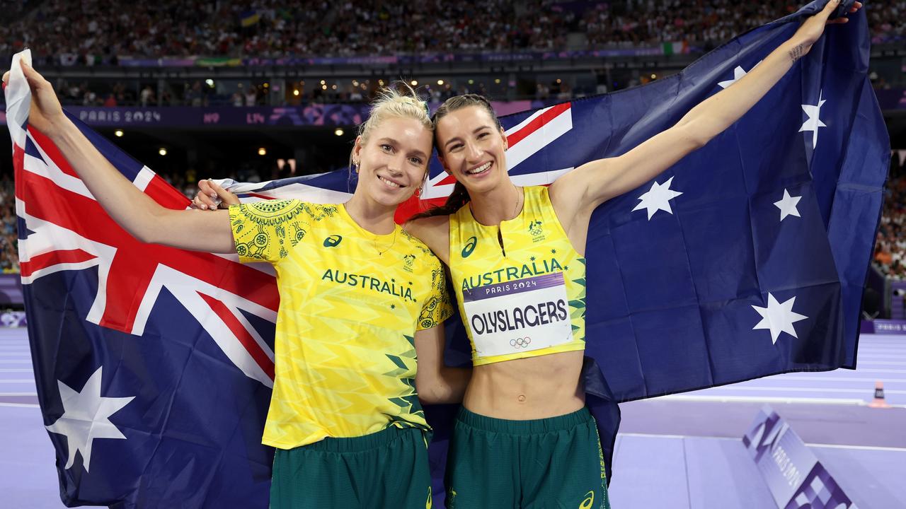 Silver medallist Nicola Olyslagers, right, celebrates with teammate and bronze medallist Eleanor Patterson of Team Australia after the women's high jump final. Picture: Cameron Spencer/Getty Images