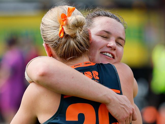 Alyce Parker embraces Claire Ransom after a tough week for the Giants’ AFLW players.